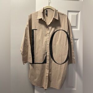 Stylish Tan Blouse with Black Accents